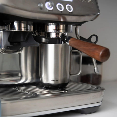 Ember Mug 2 charging coaster keeps beverage warm all day.