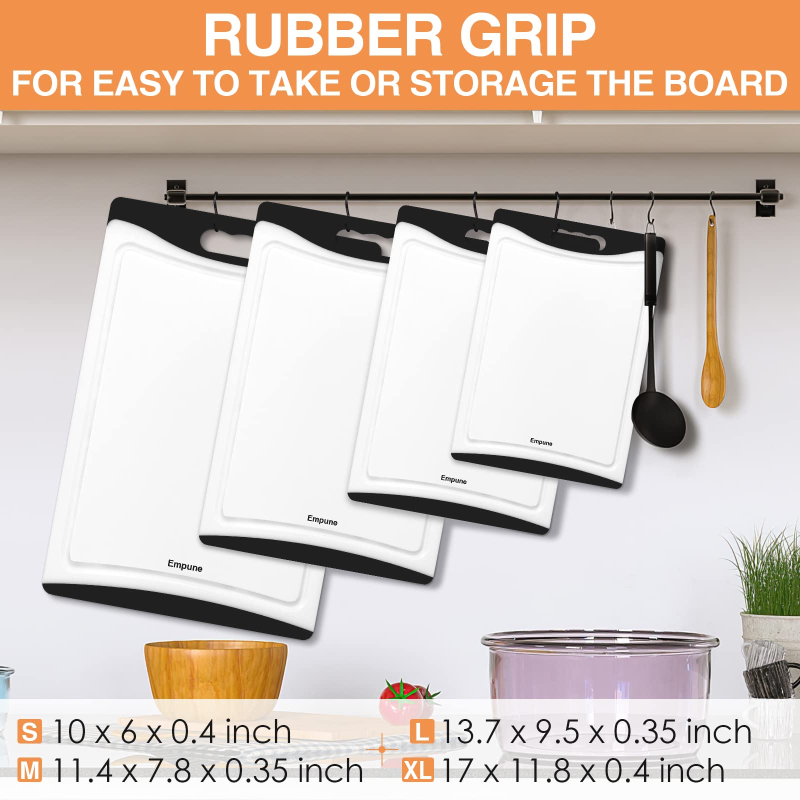 Empune cutting board features easy-grip handles for stable chopping.