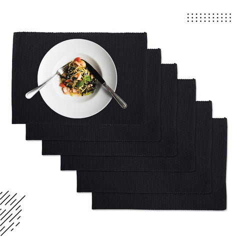 Machine washable Encasa XO placemats simplify cleanup after meals.