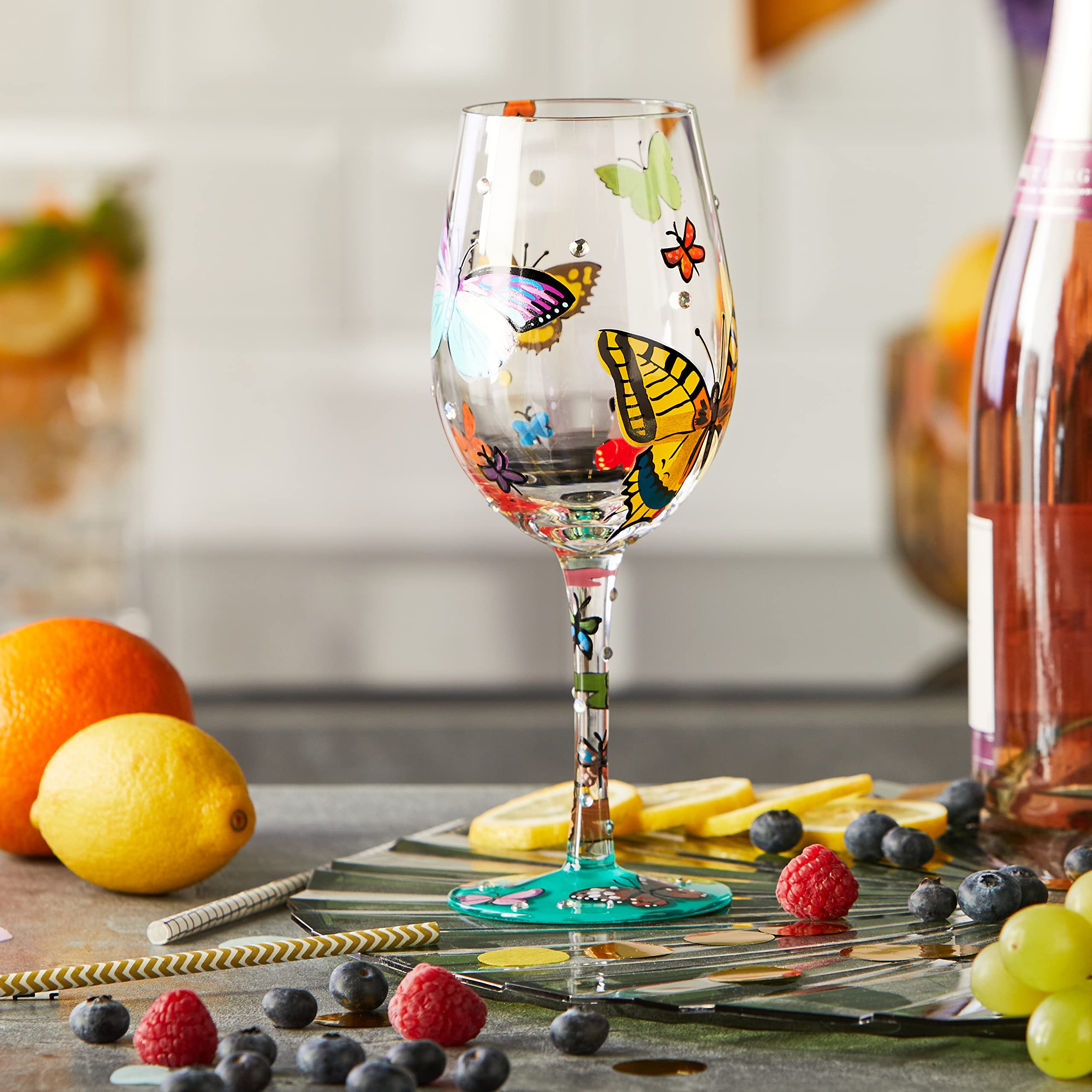 Hand-painted butterfly glass from Enesco adds color to gatherings.