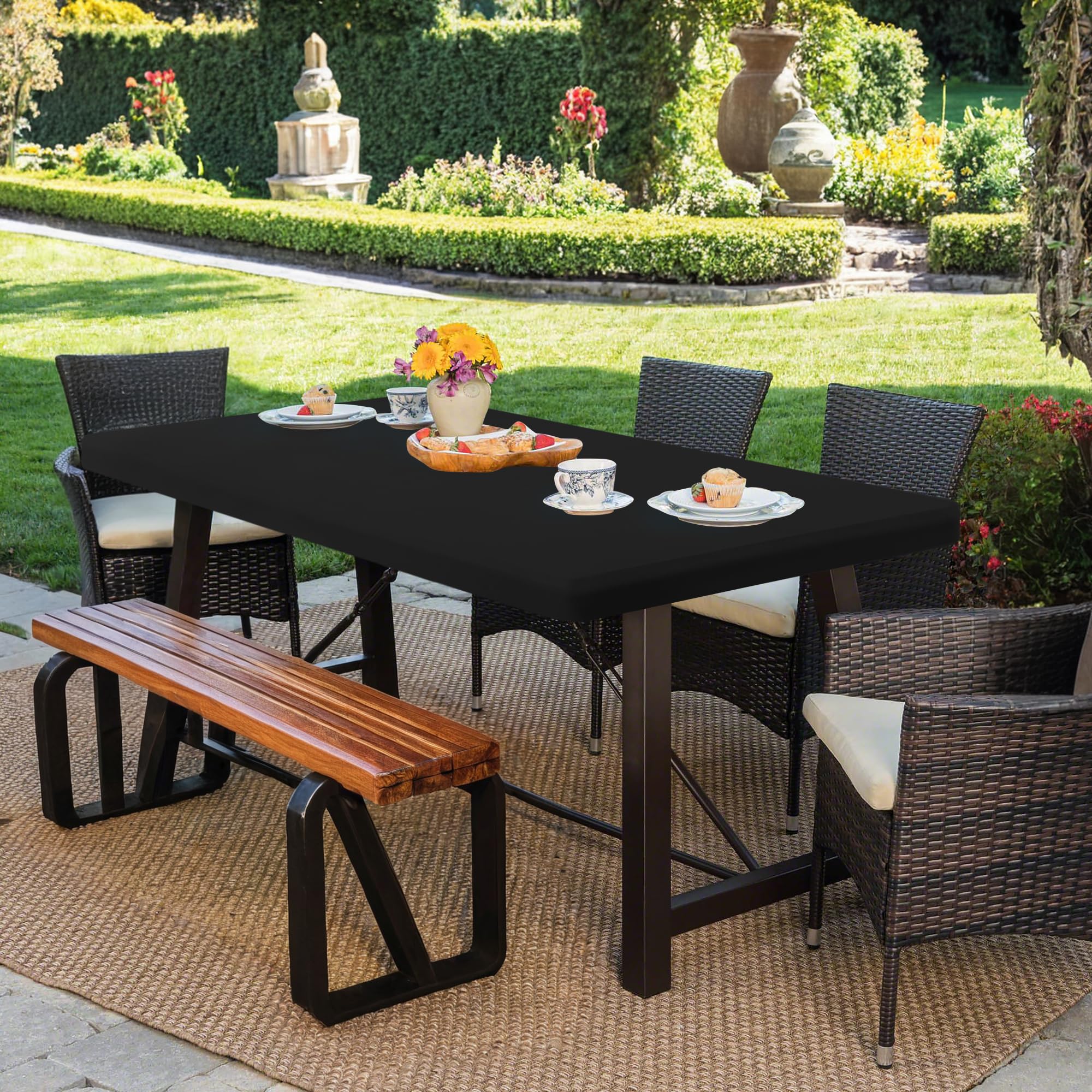 Enjoyidea fit stays in place on patio tables during wind.