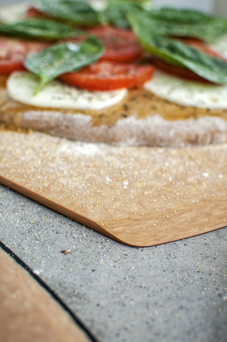 Epicurean pizza peel in natural color with nonporous surface for clean prep