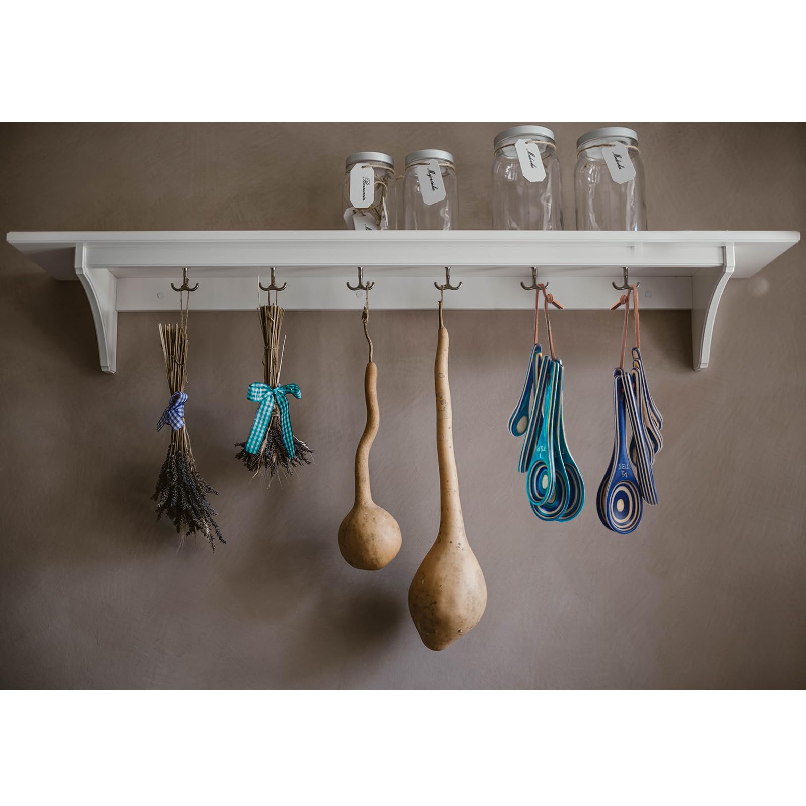 Esie Houzie measuring spoons with oval scoops fitting tight jars.