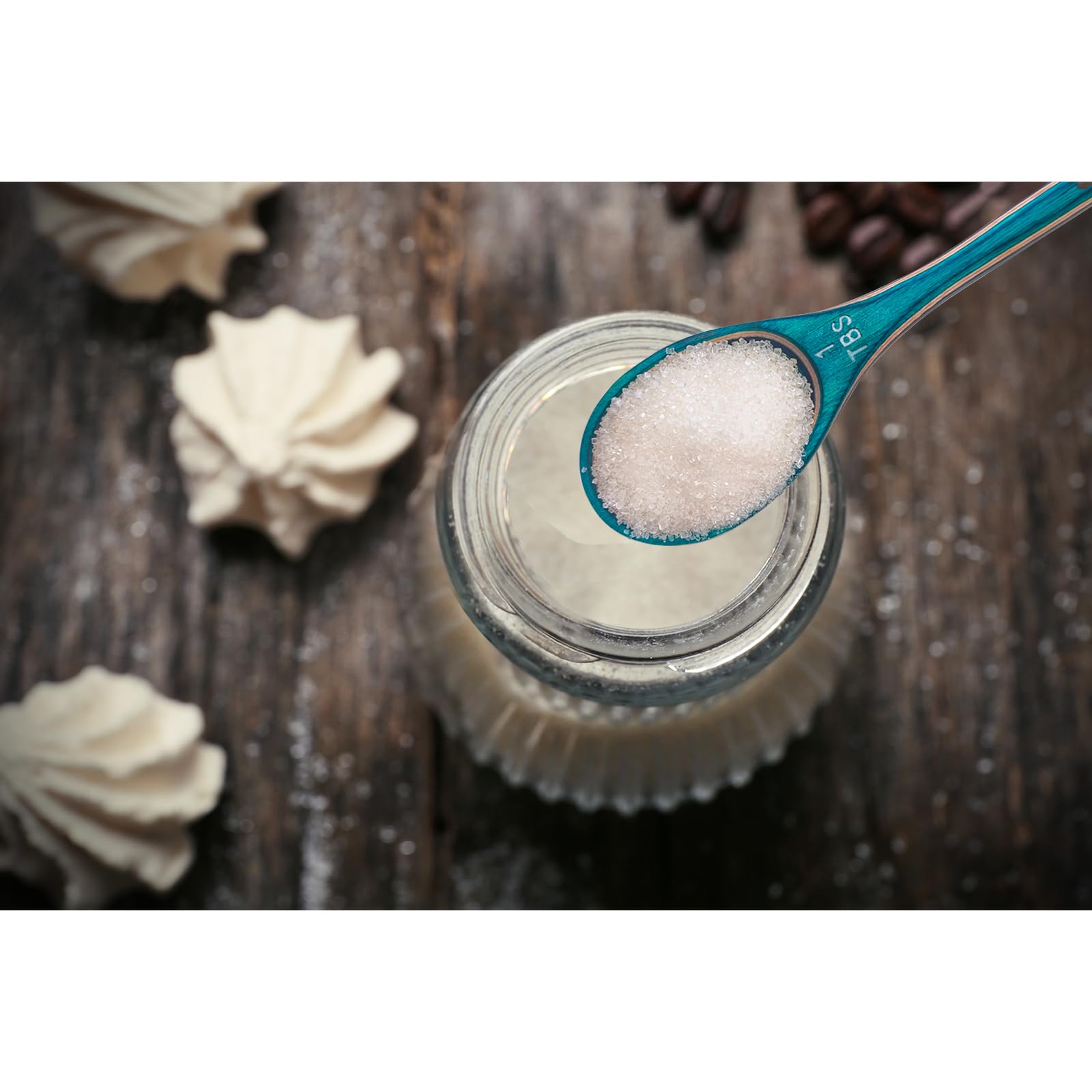 Esie Houzie oval scoops fit into spice jars to reduce spills