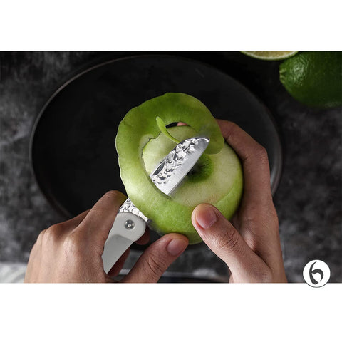 Esie Houzie swivel peeler for fast fruit and vegetable prep.