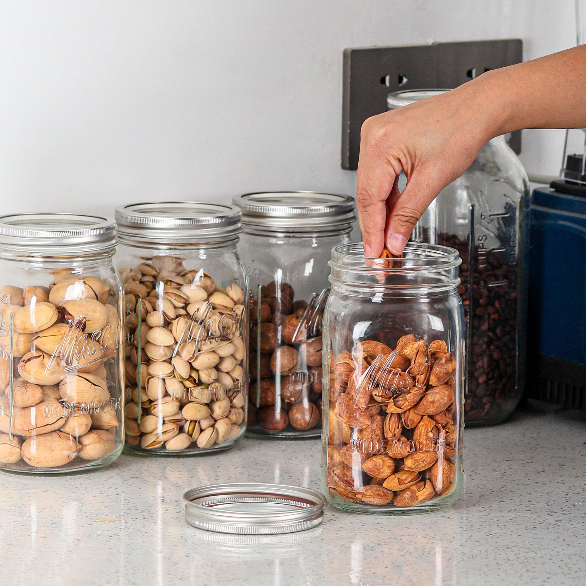 Esrentle jar storage in pantry demonstrates organized kitchen setup