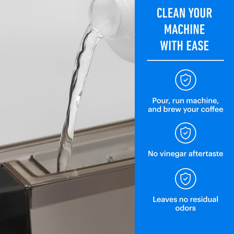 Essential Values descaling solution beside Breville coffee machine, ready for maintenance