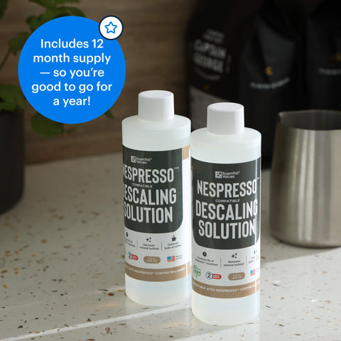 Essential Values Nespresso descaler product setup on countertop with cups ready
