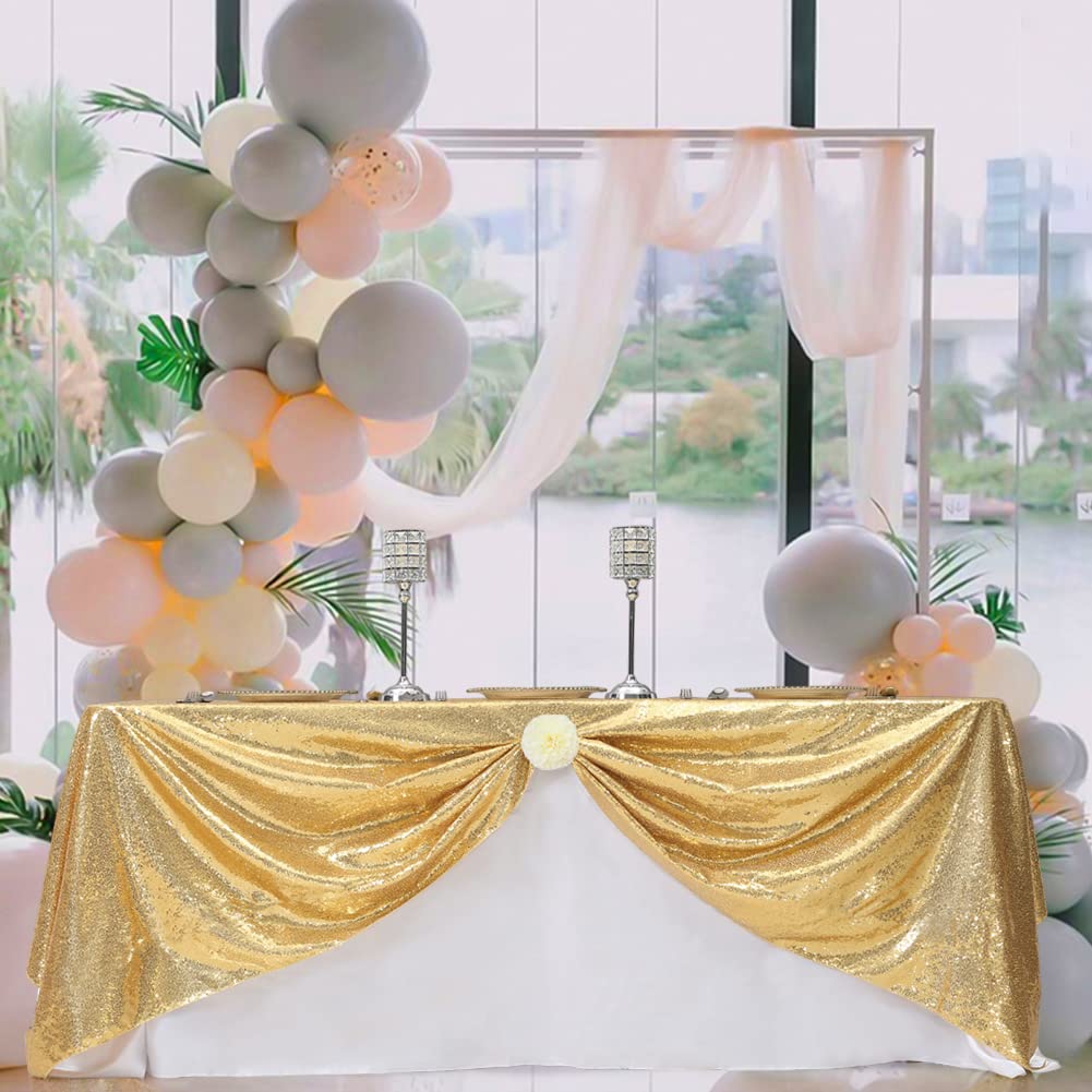 Eternal Beauty gold tablecloth on a dining table for an elegant celebration.