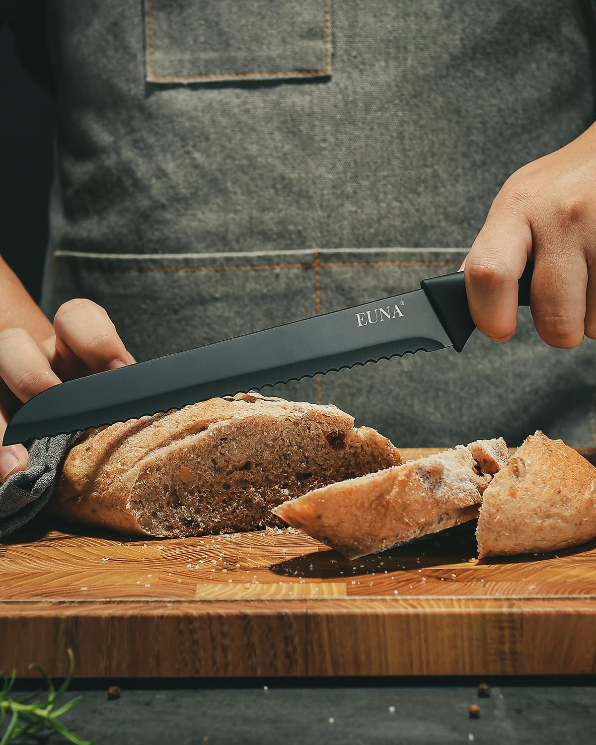 EUNA transparent acrylic knife block keeps blades visible and neatly stored.
