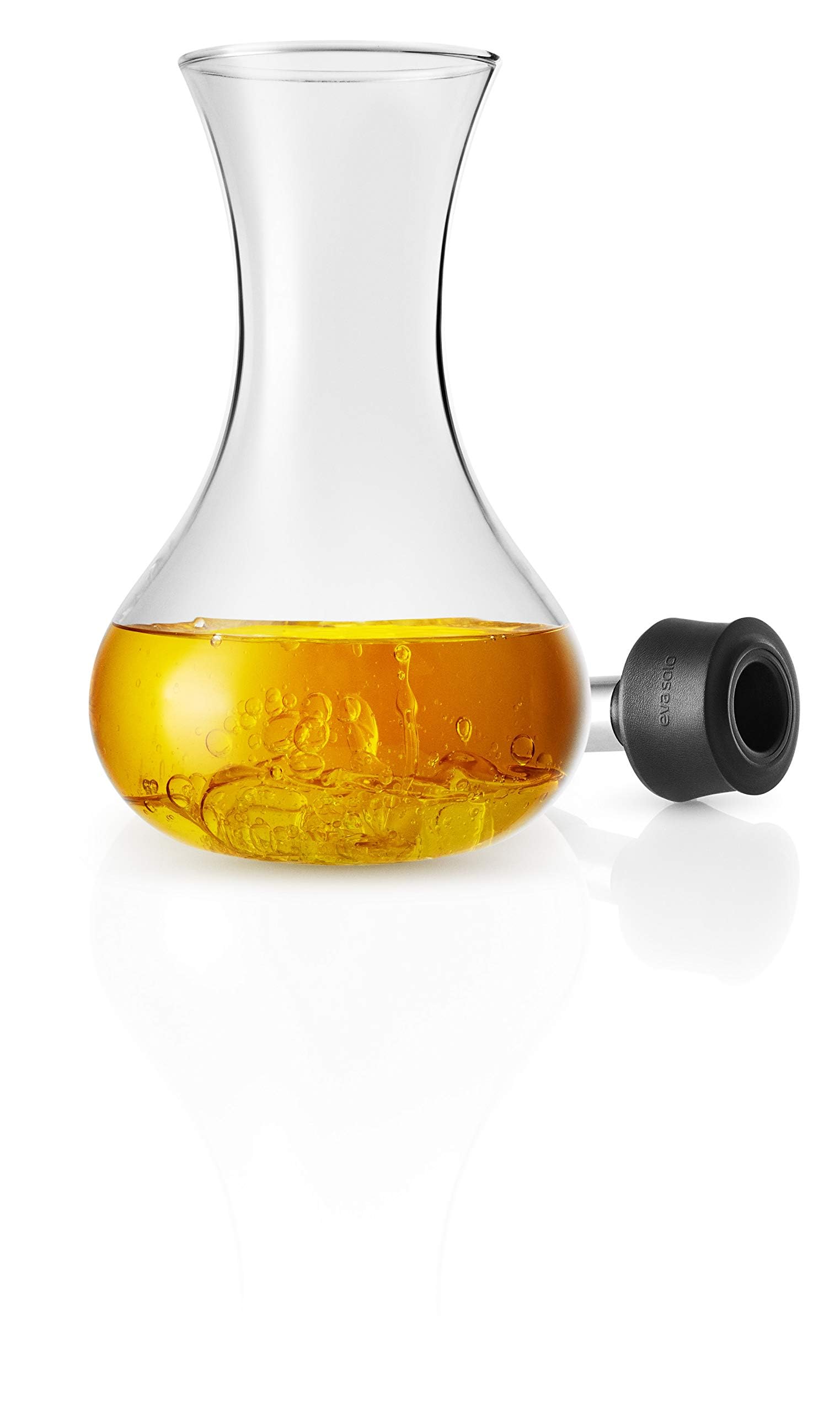 Eva Solo dressing shaker wide opening enables quick ingredient addition.