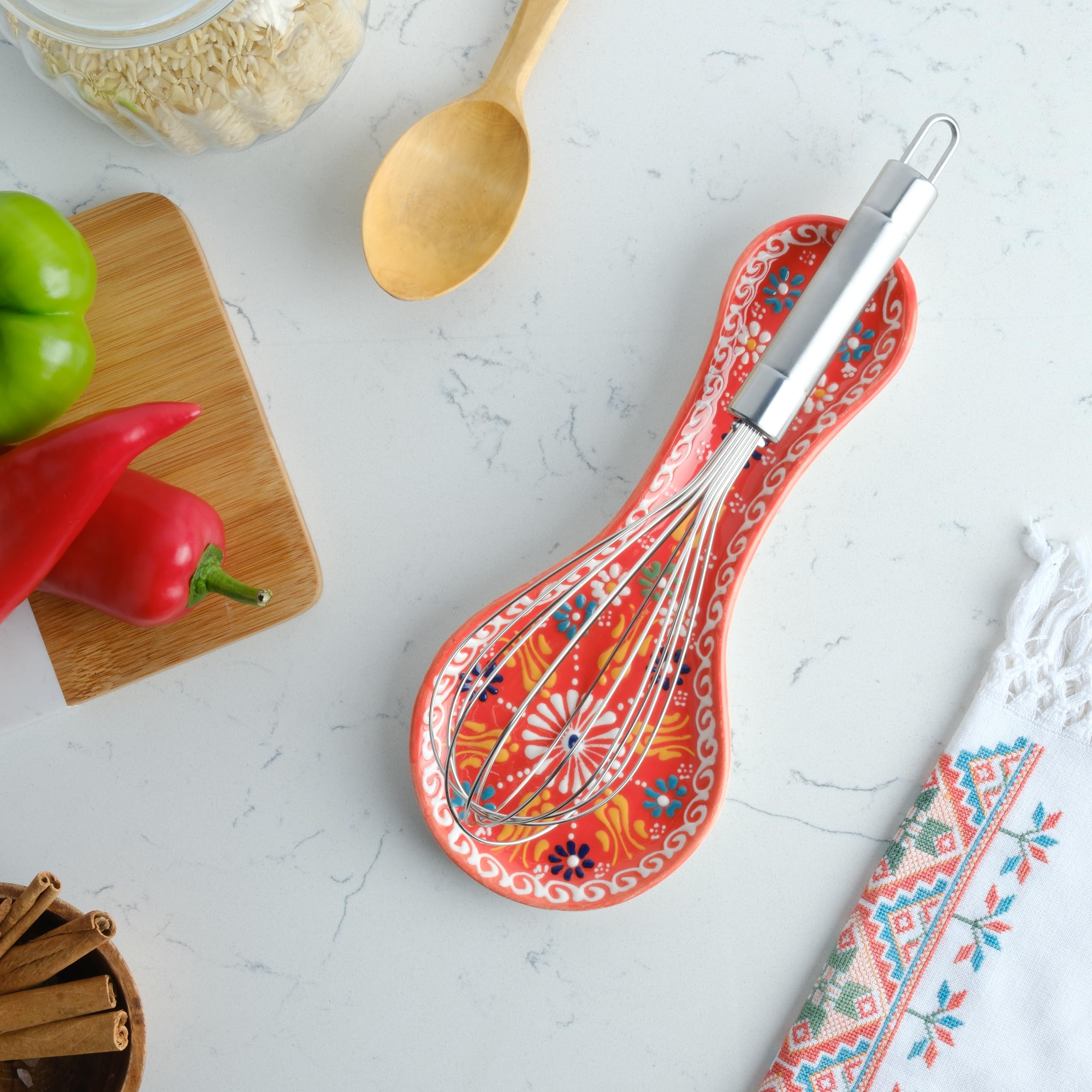 Evanilife ceramic spoon rest dishwasher safe for easy cleanup.