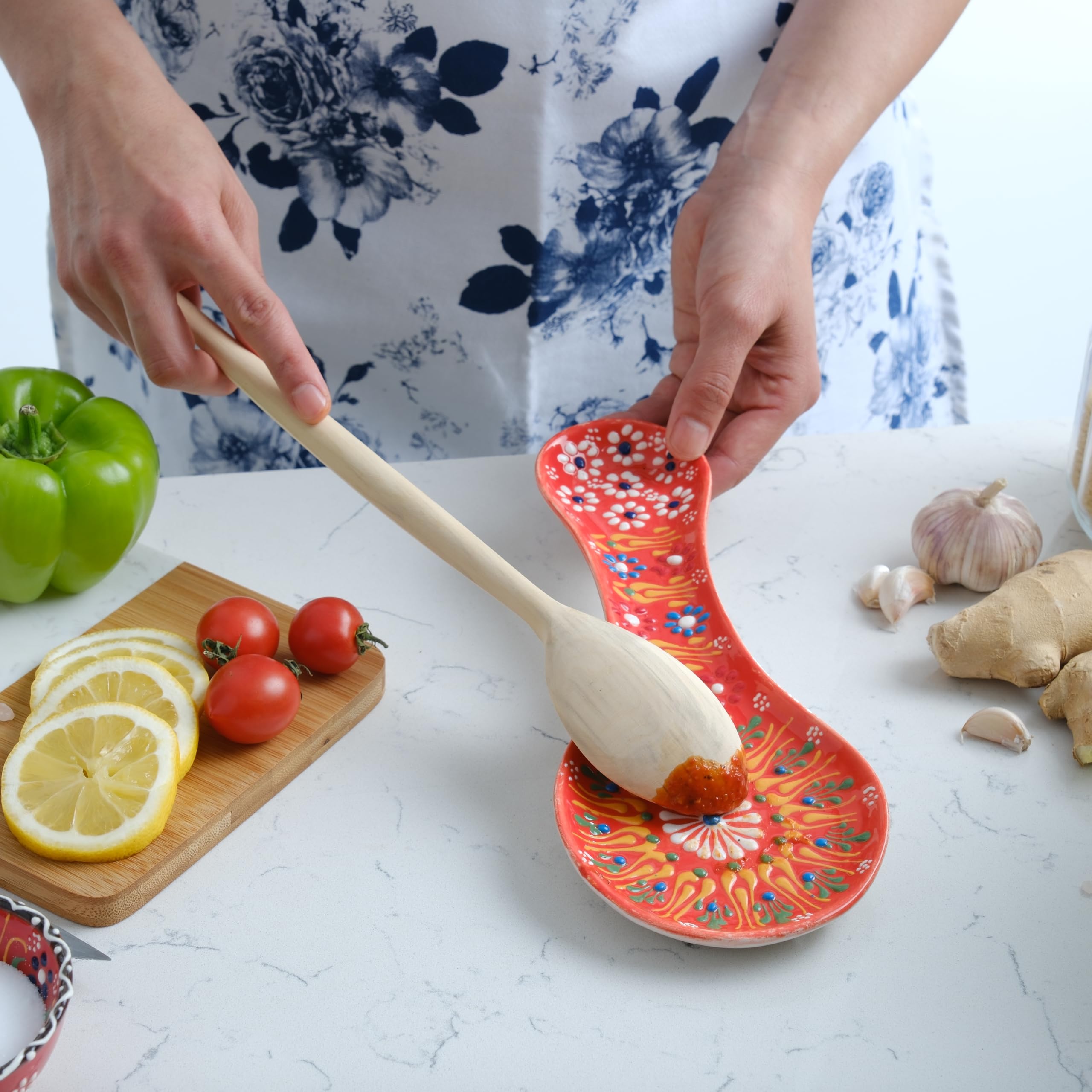 Evanilife decorative spoon rest on counter adds color and organization.
