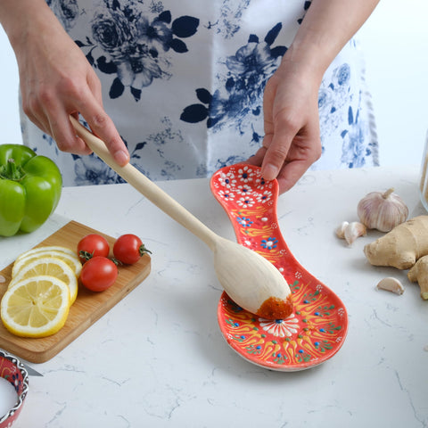 Evanilife decorative spoon rest on counter adds color and organization.