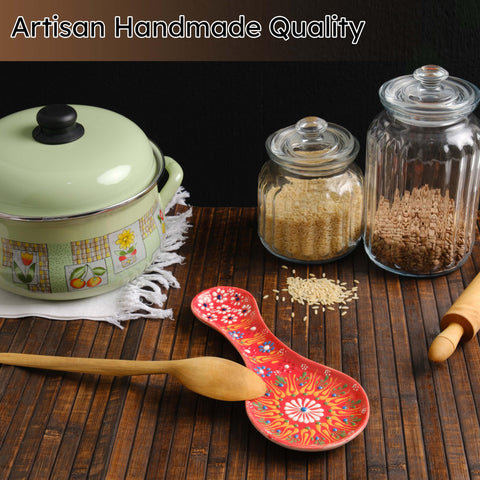 Evanilife orange spoon rest with unique pattern for stylish kitchen decor.