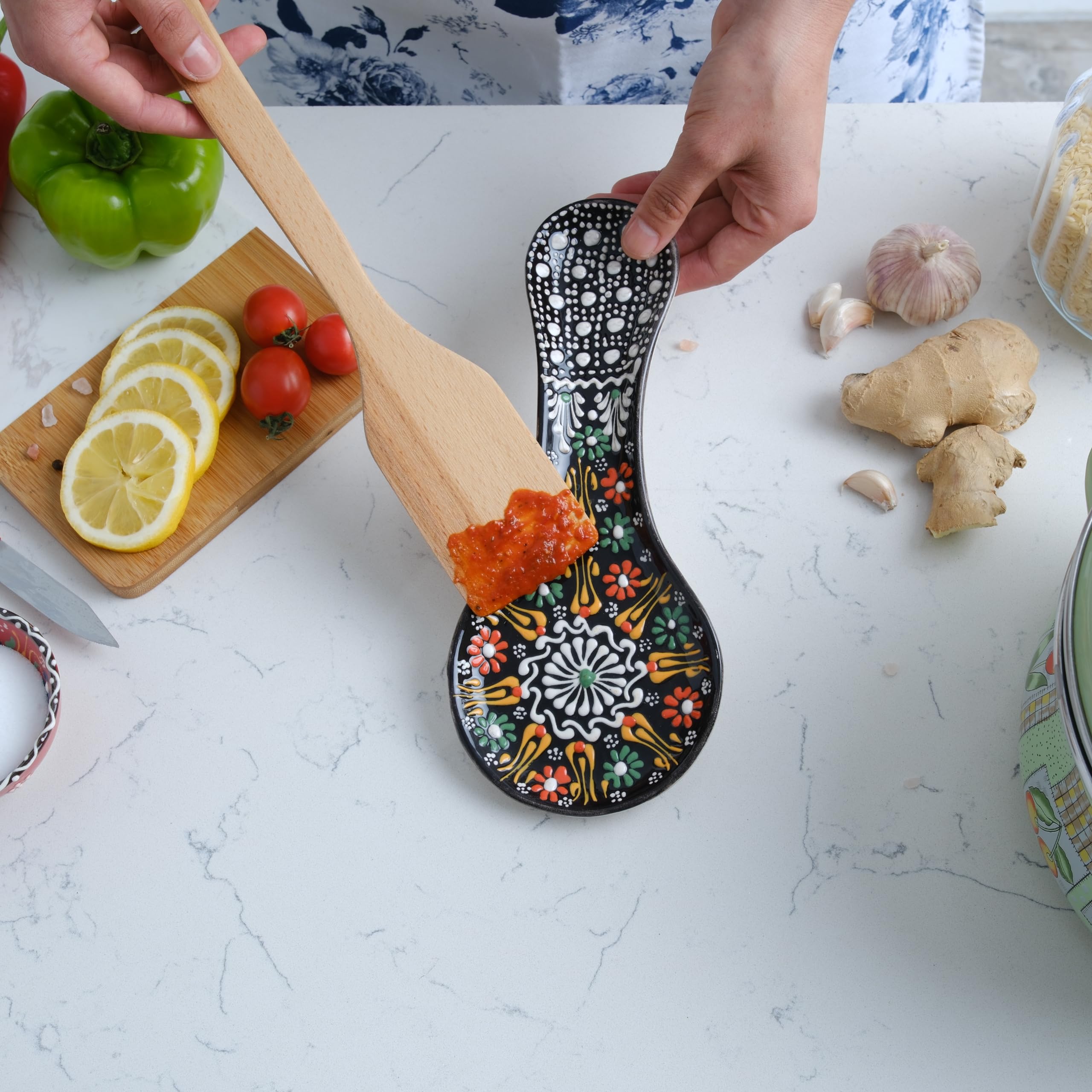 EVANILIFE spoon rest on kitchen counter keeps utensils organized.