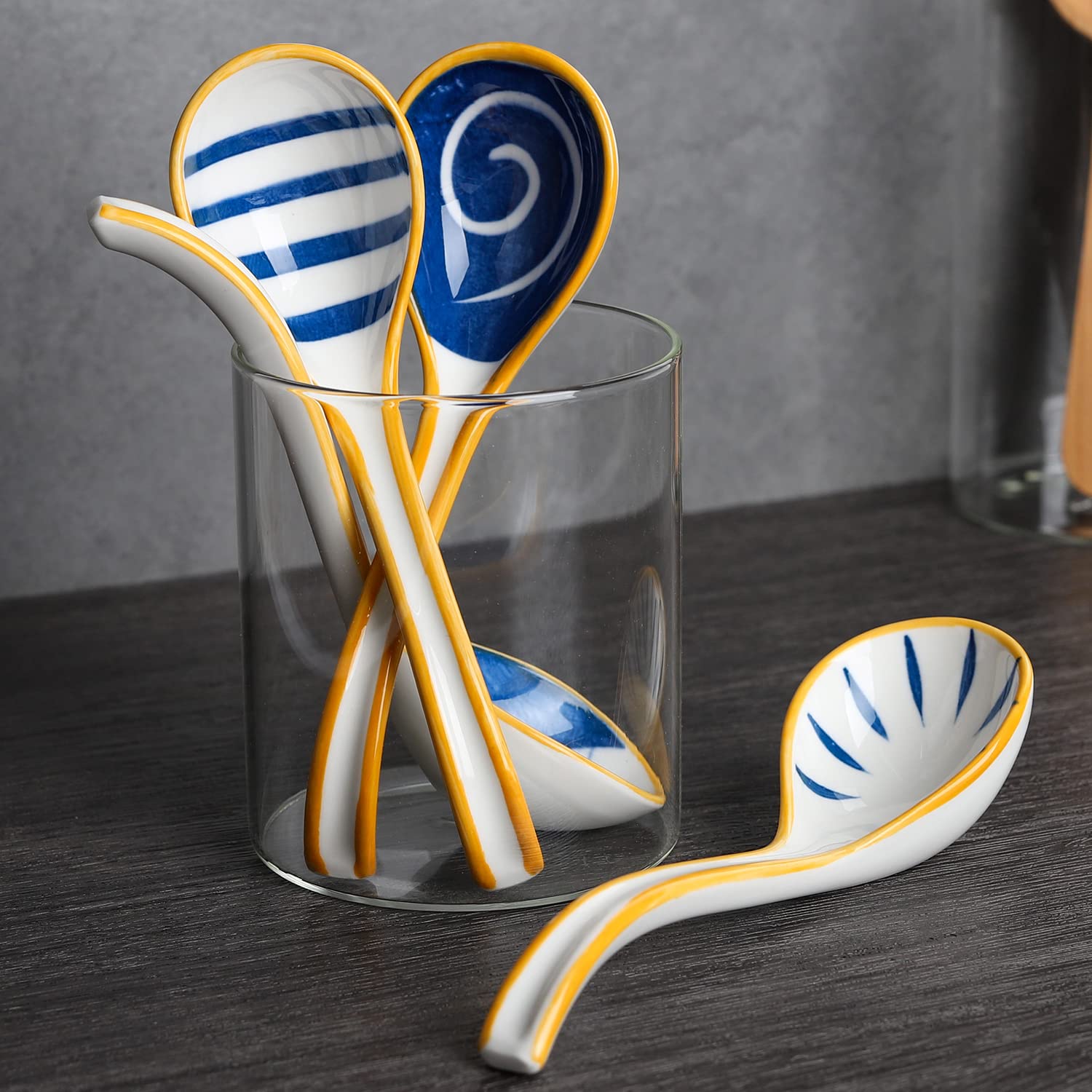 Evannt porcelain spoon featuring patterned head for elegant table settings
