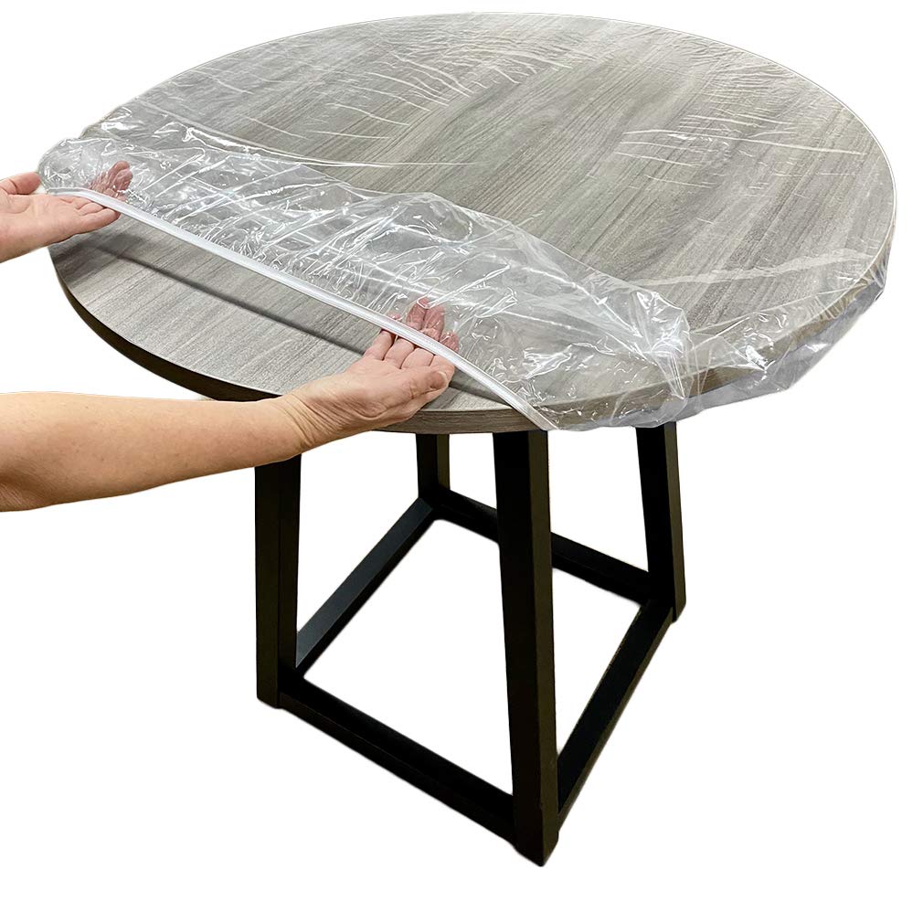 Evelots clear round table cover with elastic edge fits 36–42 inch tables and shields from spills.