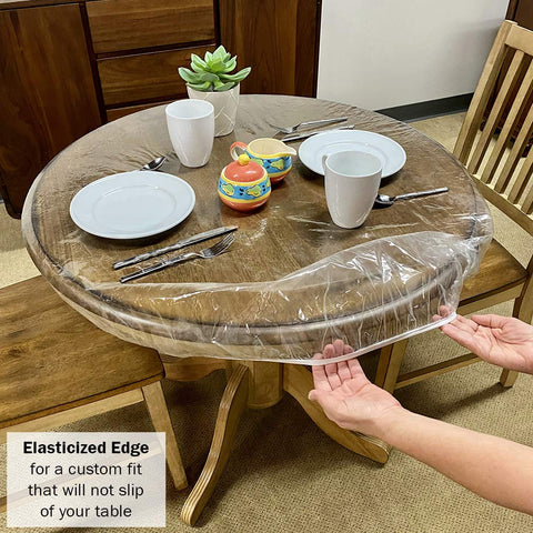 Evelots clear round table cover provides a snug fit during meals and crafts.