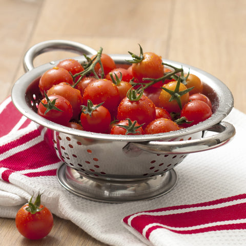 ExcelSteel colander with oversized handles for a comfortable, secure grip.