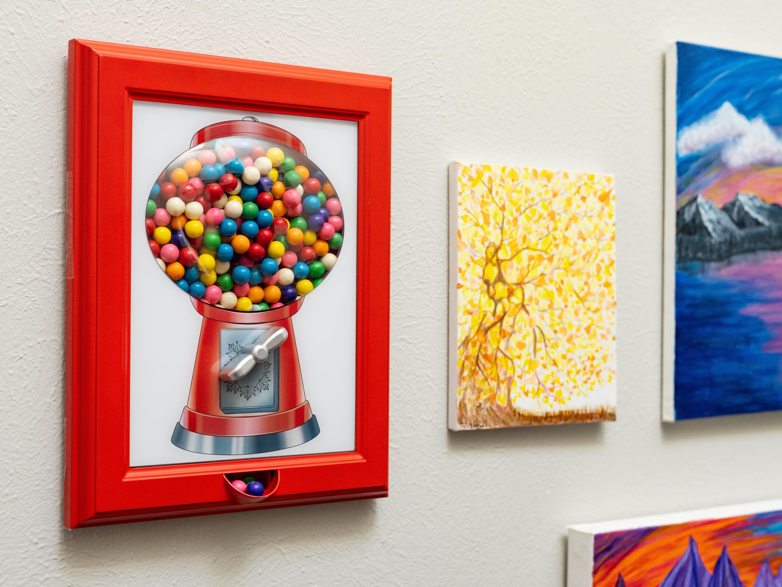 Eye Candy Frame 3D globe artwork highlights colorful candy display.