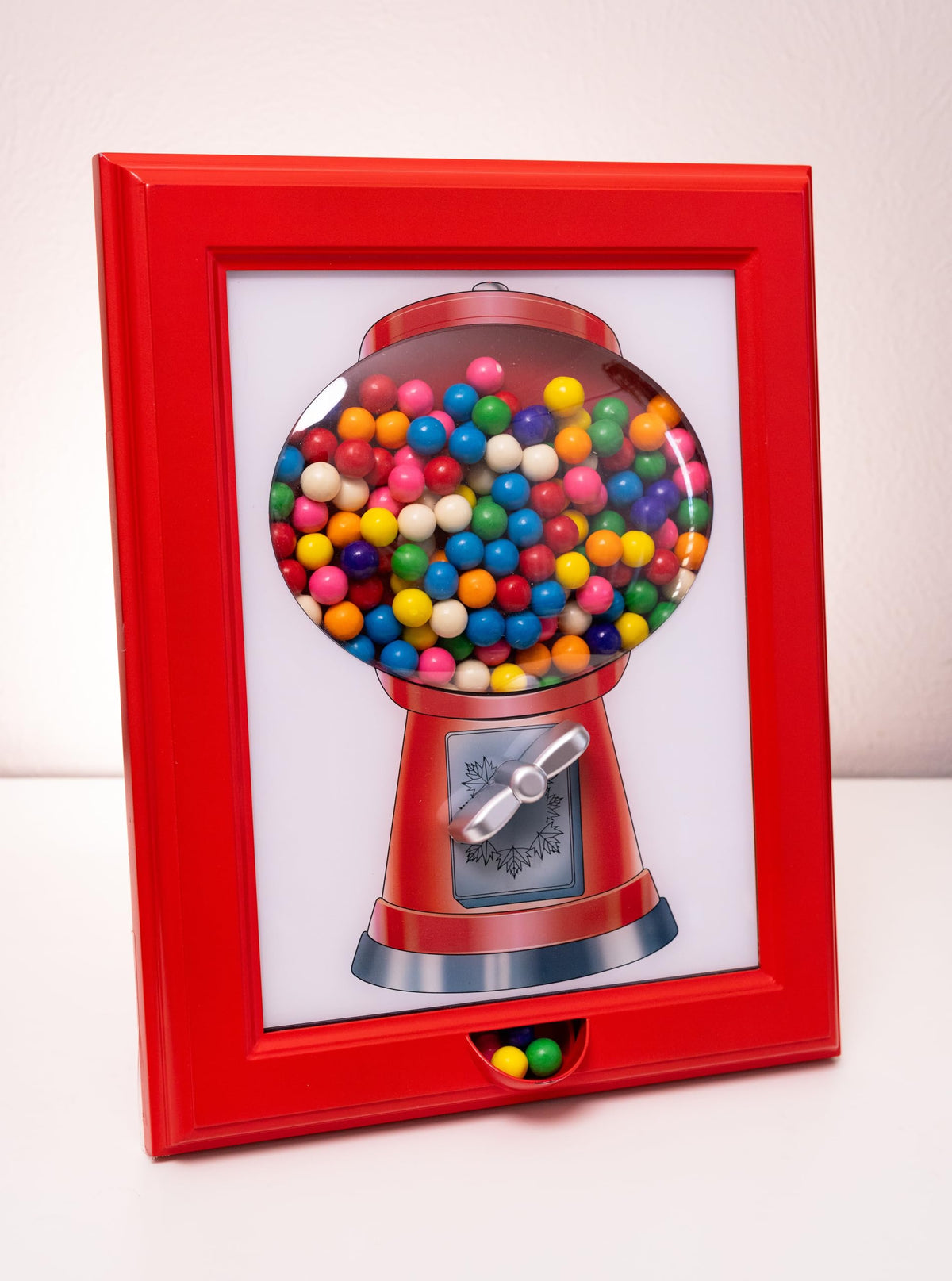 Eye Candy Frame dispenses treats for quick, mess-free snacking.