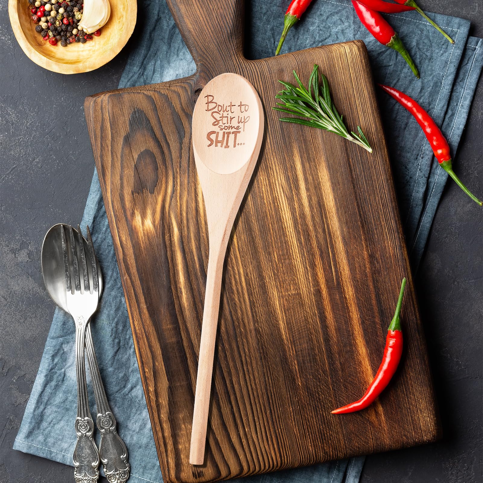EYEOO serving spoon used for mixing or presenting dishes with flair.