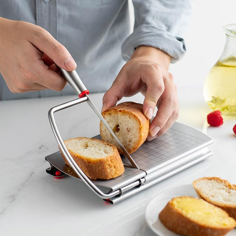 Faat3 Coi4 slicer cutting a block of cheese and butter