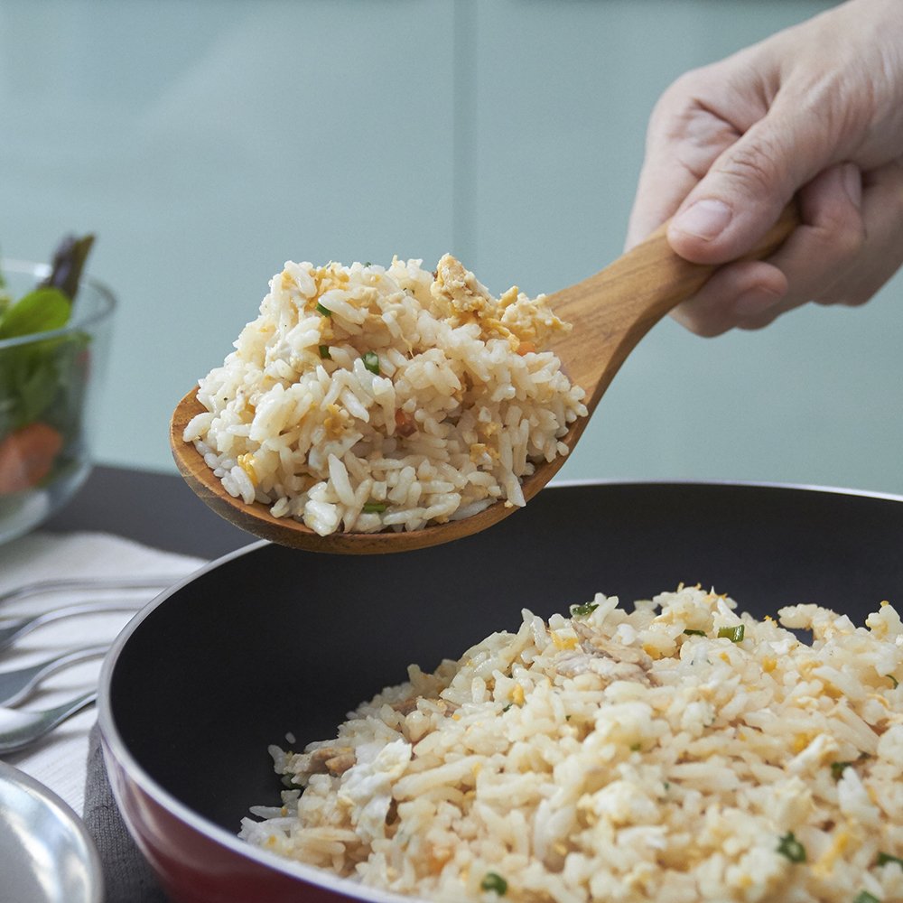 FAAY versatile teak spoon with ergonomic handle for comfortable stirring