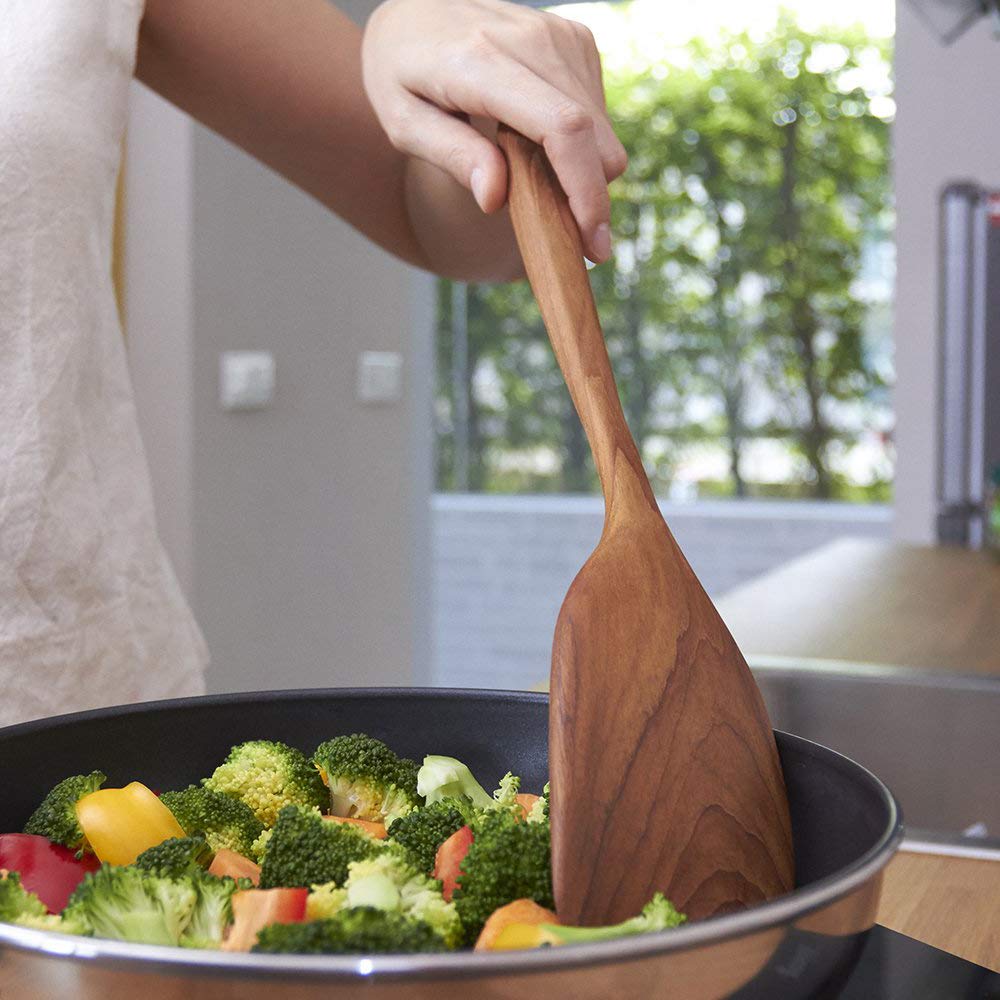 FAAY wooden spatula with 3-inch wide head designed to follow pan curves.