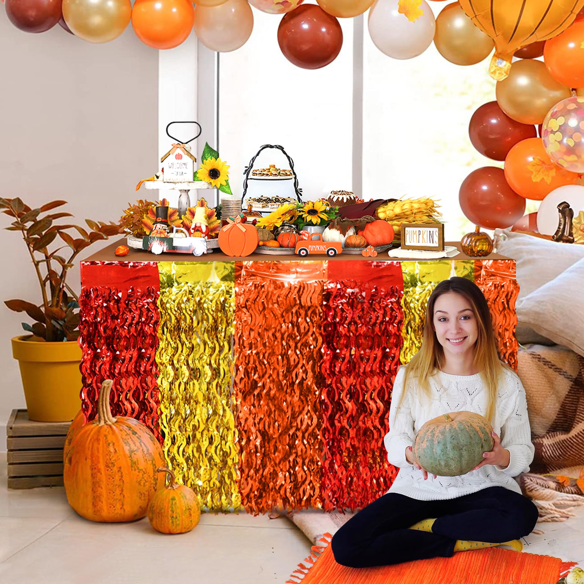 Faiclrr round table skirt creates fall harvest ambiance.