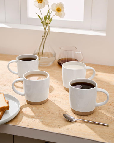 Kiln-fired Famiware Milkyway stoneware mugs resist chips over time.
