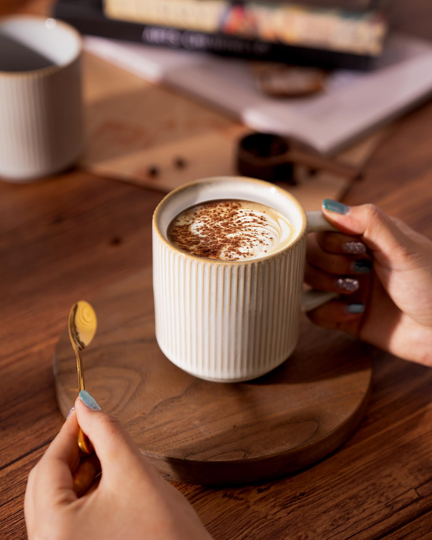 Famiware stackable mugs with grooves for stable nesting and storage.