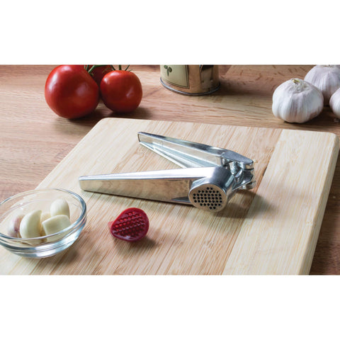 Fantes Cousin Umberto’s garlic press in action pressing a clove