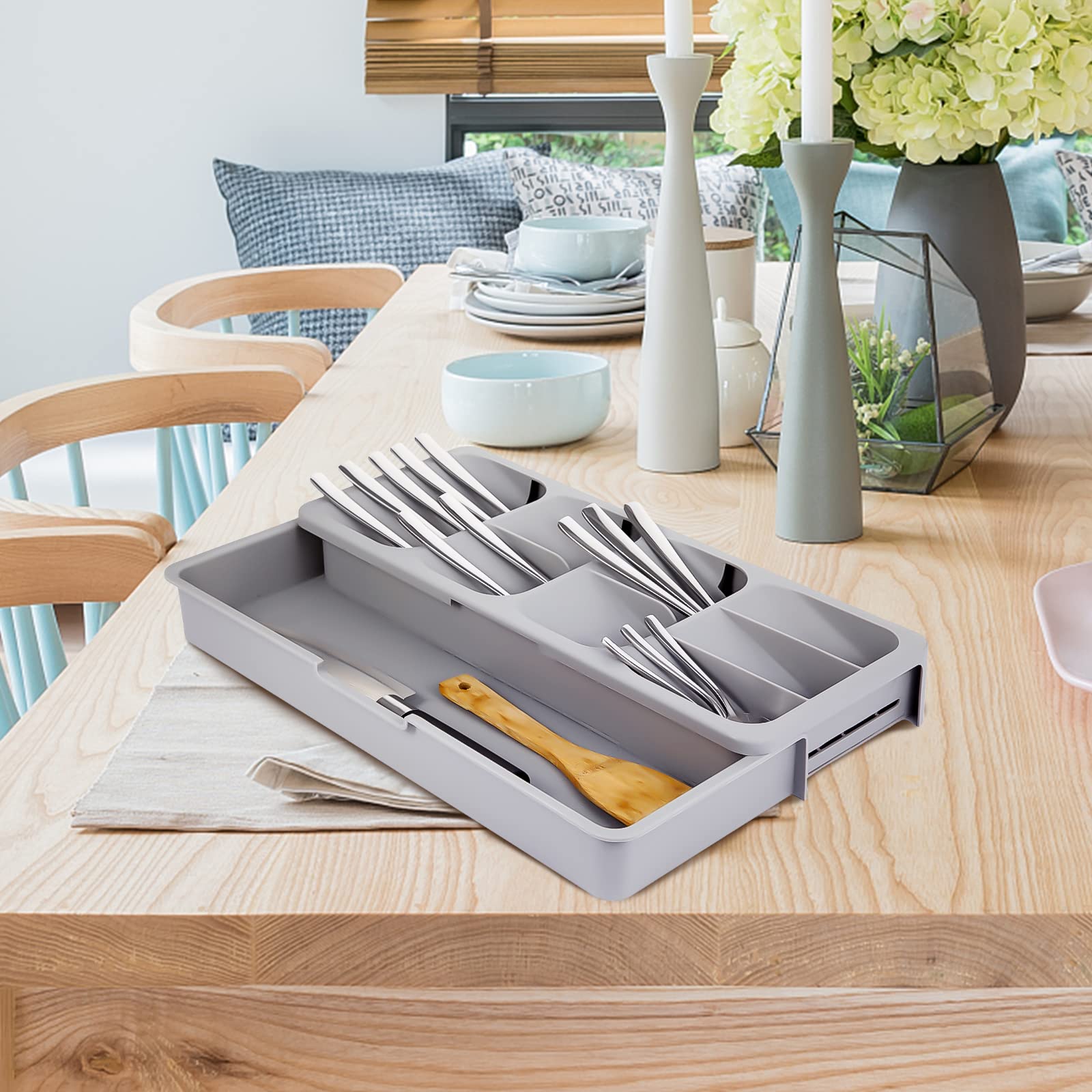 Faridabio full setup with spoons, forks, and knives neatly organized.
