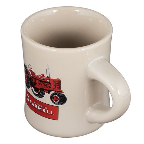 Farmall vintage tractor art decorates mug for nostalgic tea or cocoa moments.