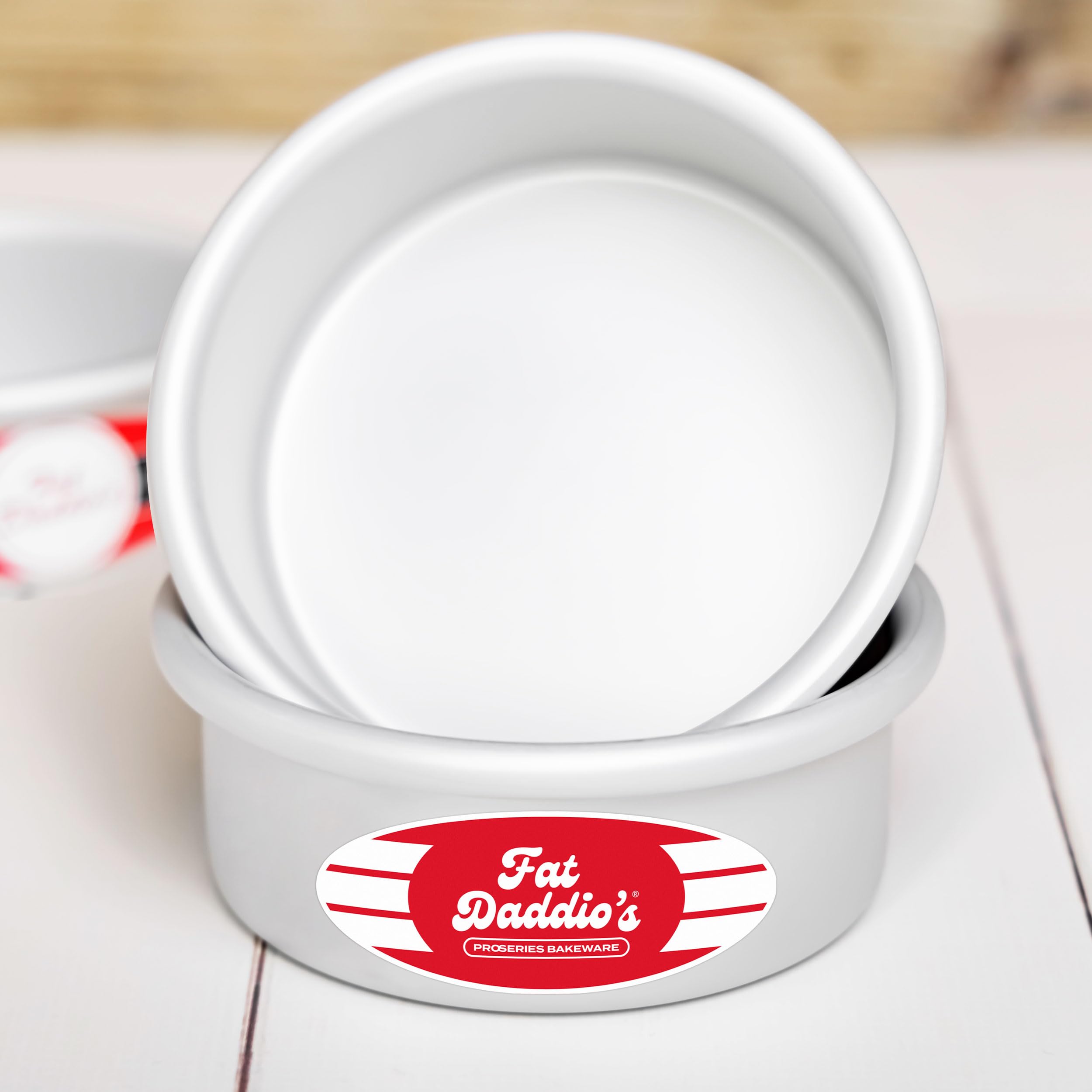 Fat Daddio's anodized round cake pan side view highlights deep sides for tall layers.