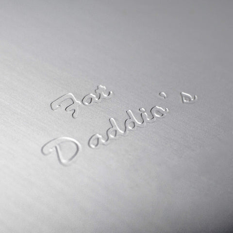 Fat Daddio's cake pans in use during baking, showing sturdy build for daily kitchen use.