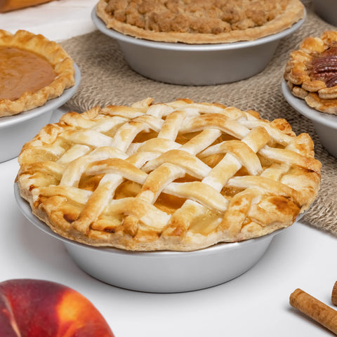 Sturdy Fat Daddio's pie pan with smooth-release design for confident handling.