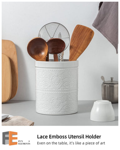 FE FUN ELEMENTS large ceramic crock on counter holding 10–15 utensils for easy access.