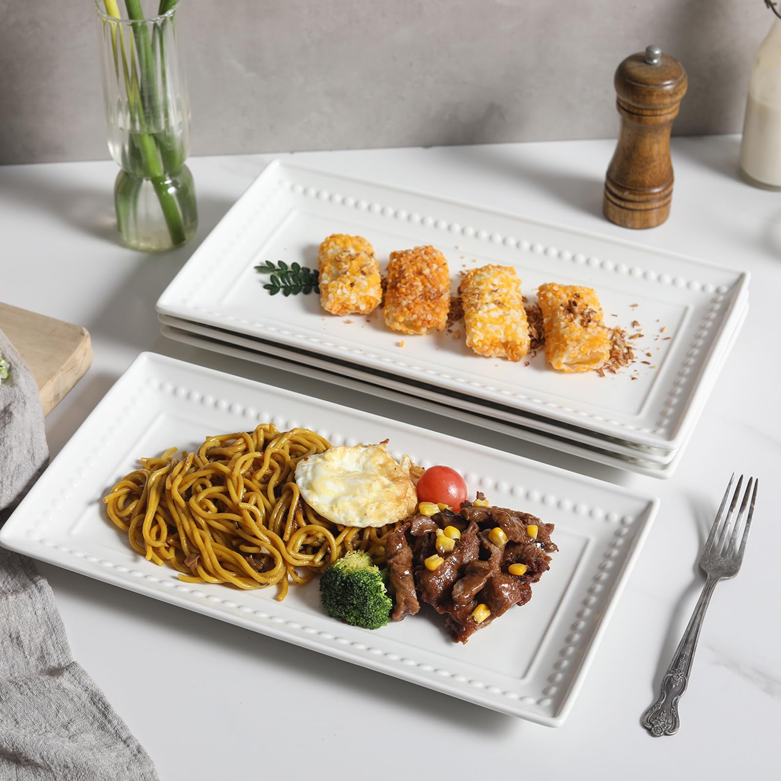 Feenmai multi-use food platter supports sushi, fruits, and snacks.
