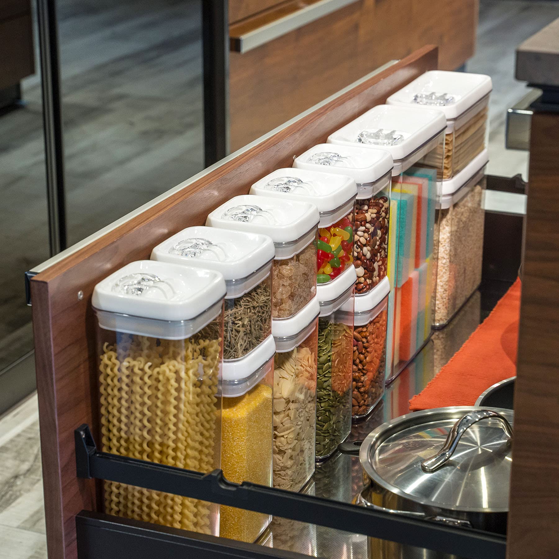 Felli Flip-Tite stackable container set showing space saving in pantry.