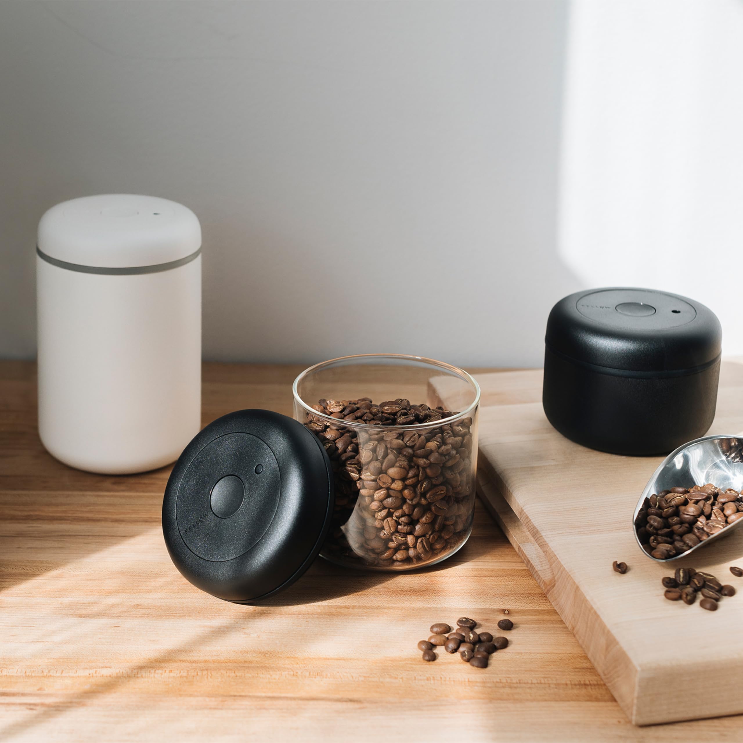 Fellow Atmos stores up to 11 oz of coffee beans for convenient brewing.