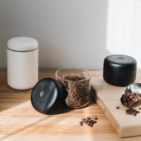 Fellow Atmos stores up to 11 oz of coffee beans for convenient brewing.