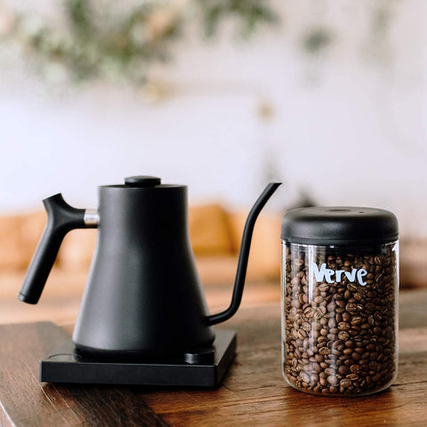 Minimalist Fellow Atmos design enhances kitchen aesthetics while organizing pantry items.