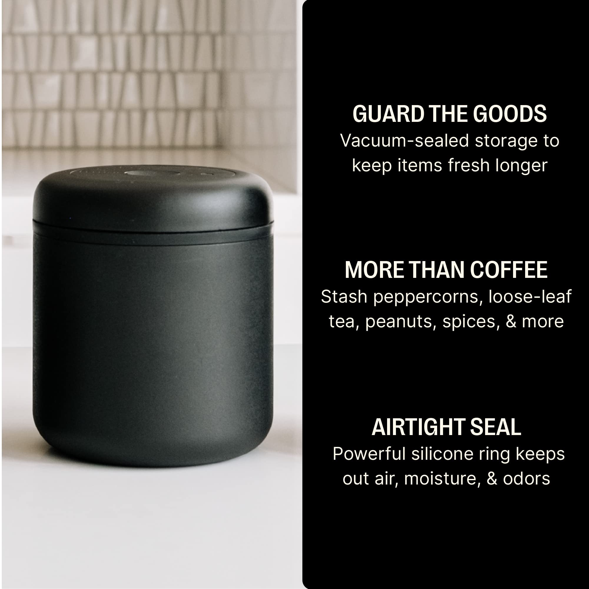 Atmos vacuum seal action demonstrates twist-to-remove-air on the lid for freshness.
