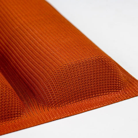 FETESUR orange silicone baking mat adds color and easy release in the oven.