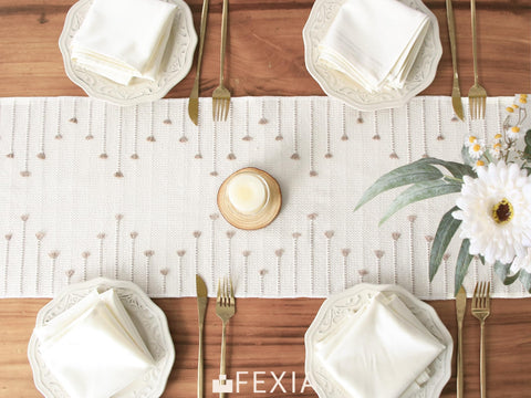 FEXIA table runner displayed on a coffee table for layered styling