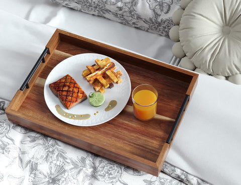 Fibogollo acacia wood tray, smooth polished surface, resists moisture and looks rustic-chic; great for coffee service.