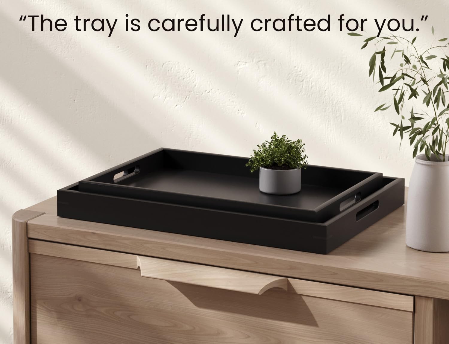 Fibogollo dual-tray set on a coffee table, versatile for serving and storage.